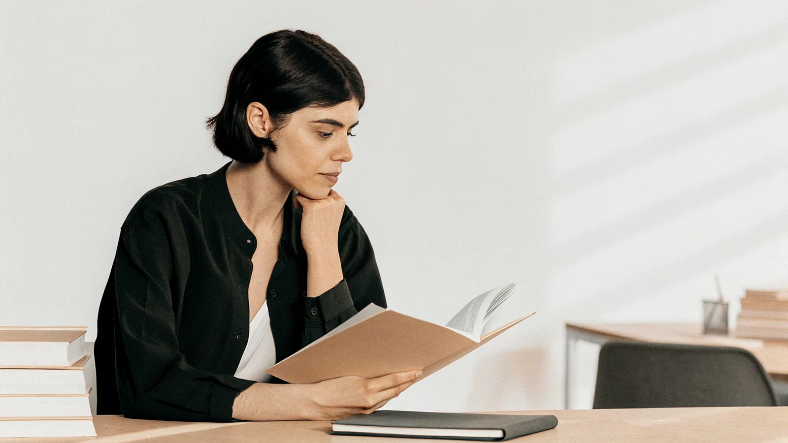Anxious-to-hopeful applicant at sunrise with Step 2 update folder
