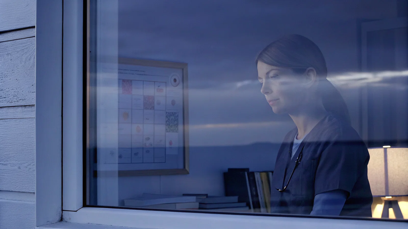 Locum physician reviewing compensation breakdown on a laptop