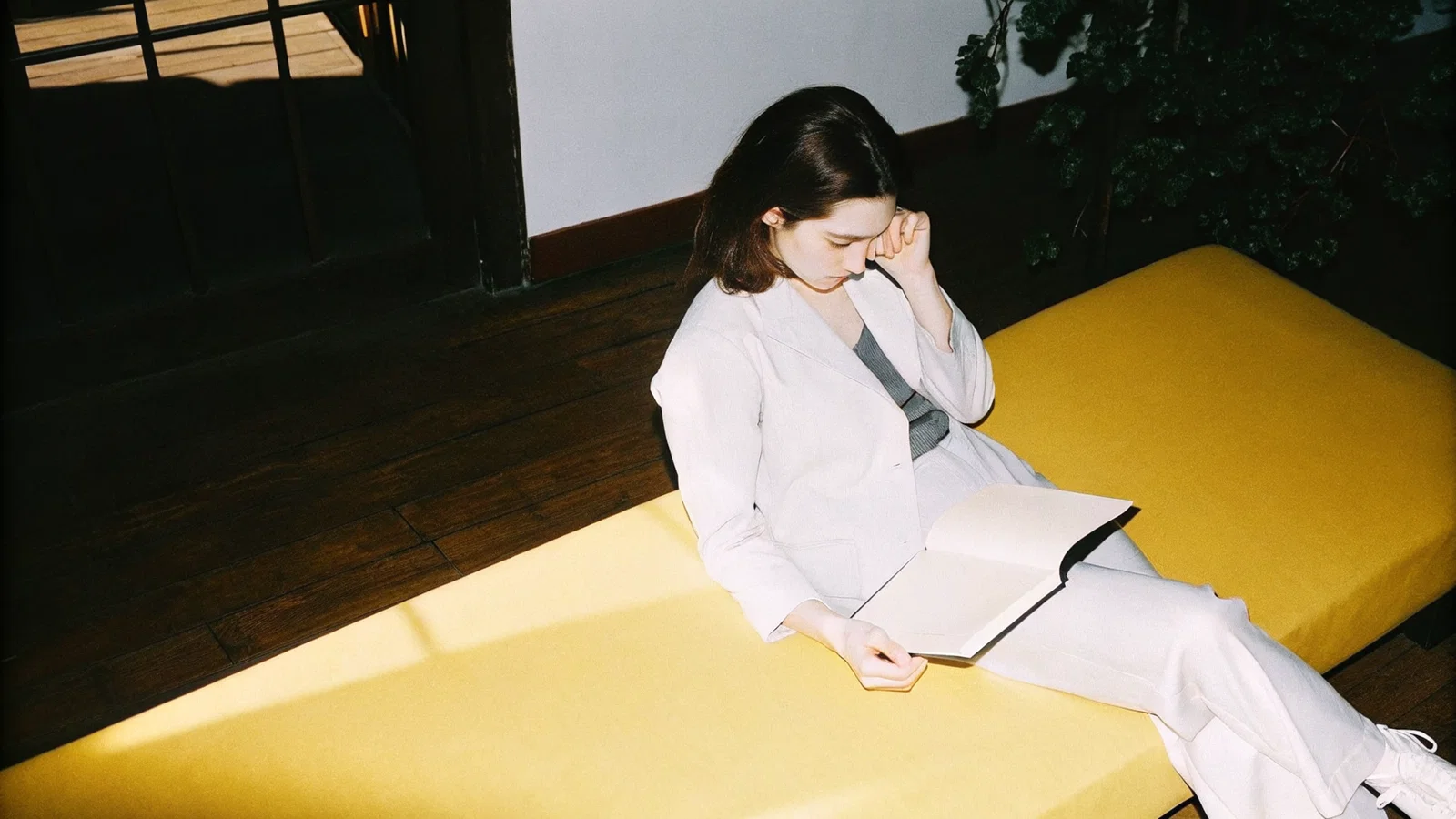 Physician reviewing a partnership contract with malpractice clauses highlighted