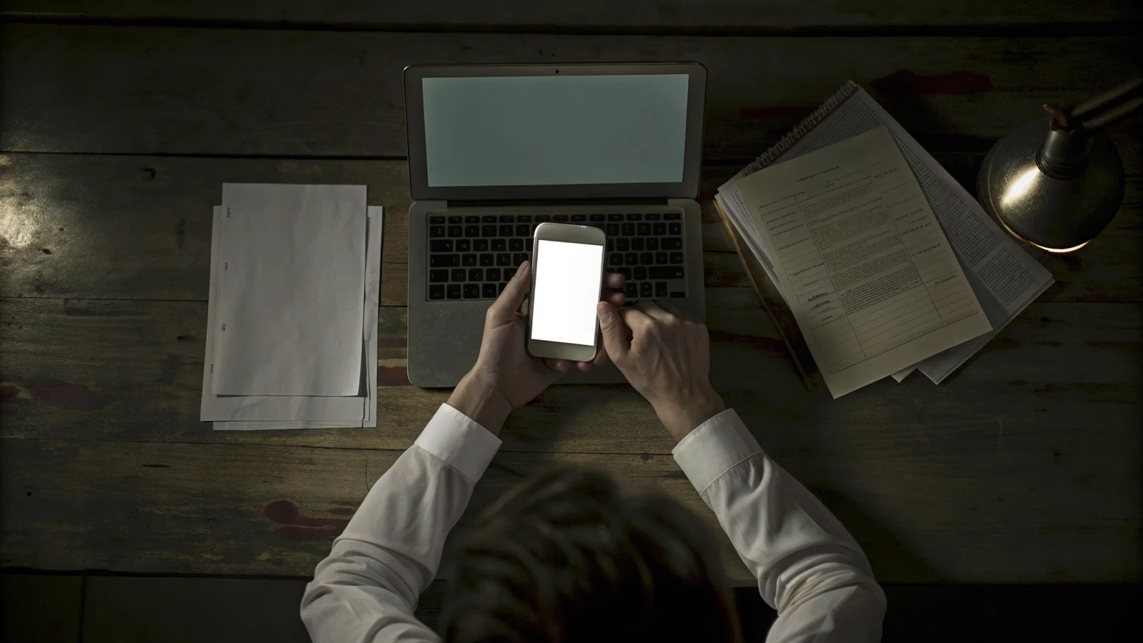COVER: Stressed Applicant Facing Empty Hospital Portal and Flickering Phone Screen