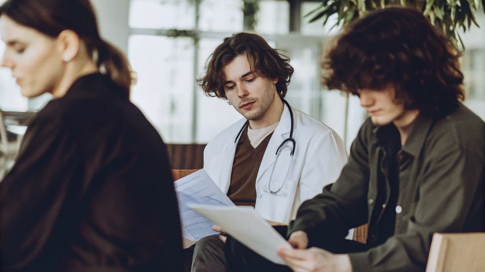 Physician Reviewing an RVU Contract Under Pressure