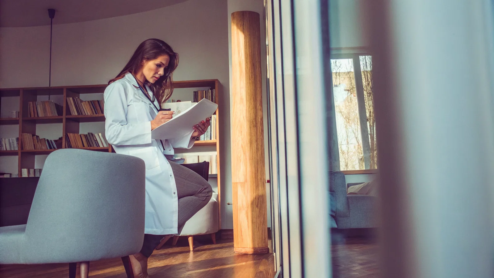 Physician reviewing a duplex purchase contract with warning notes
