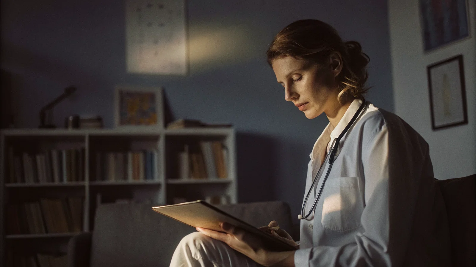 Physician Reviewing Contract Clauses During a Clinic Downturn