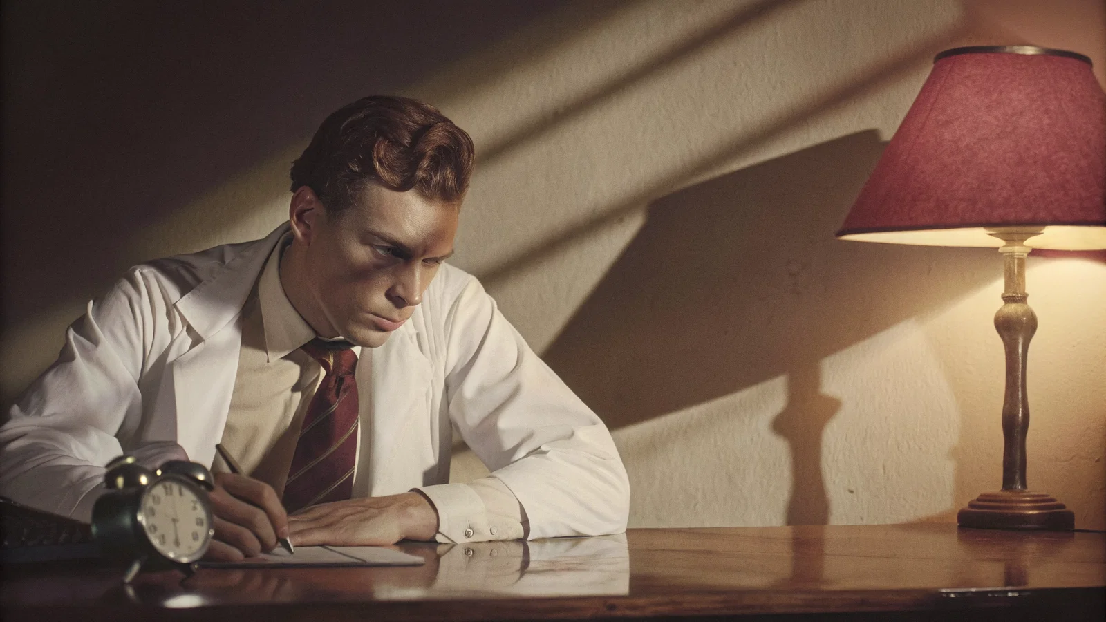 Physician reviewing retirement plan at desk